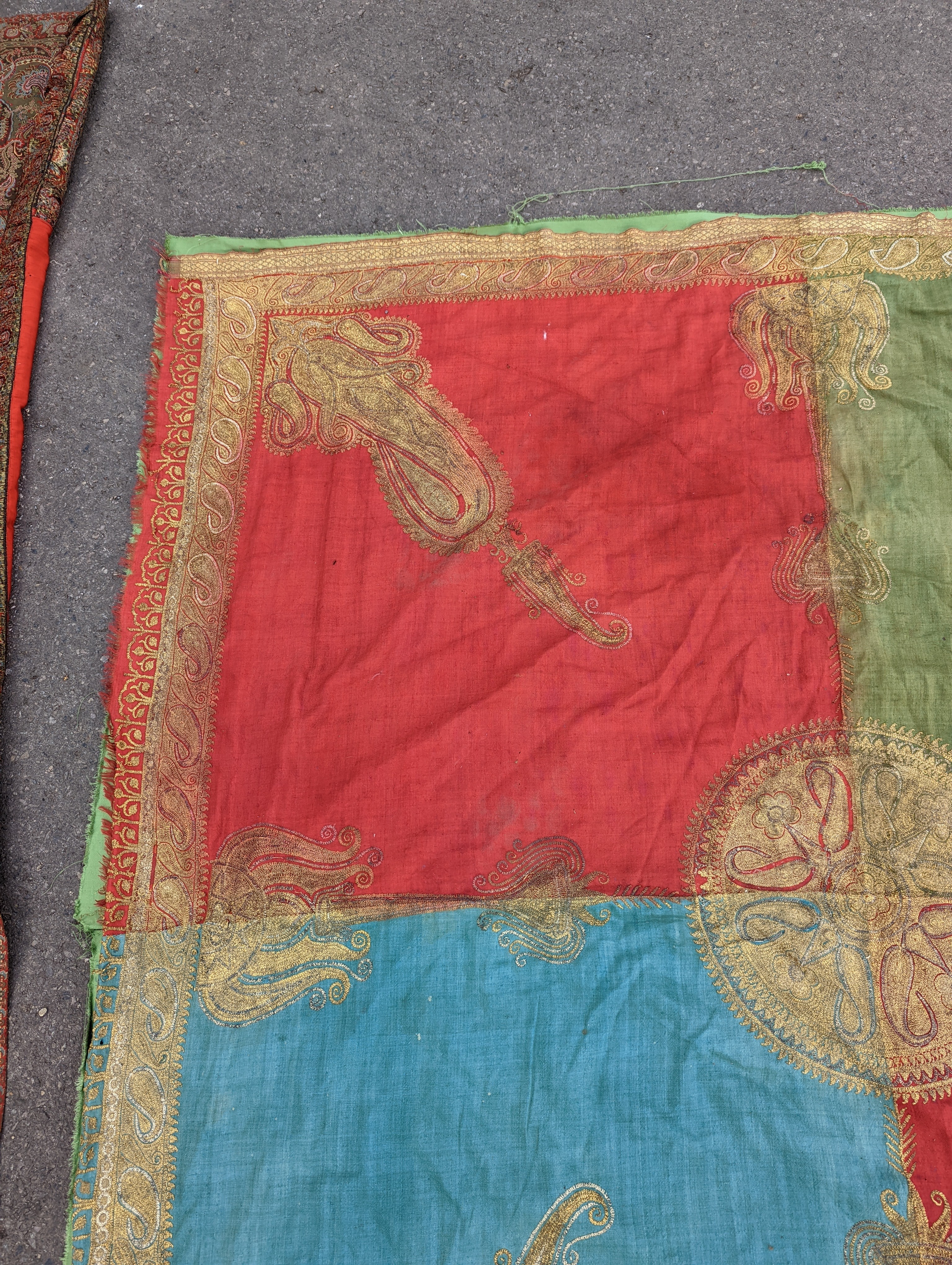 A silkwork shawl (a.f.) 270 x 140cm and an Indian embroidered cloth, 185 x180cm